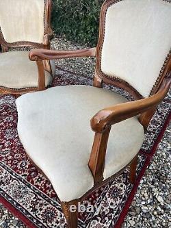 A Pair of Carved Wood French Louis Style Open Armchairs