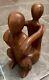 Abstract Hardwood Sculpture Couple Embracing Valentines Day