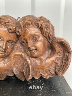Beautiful Pair of Angels/ putti's carved in wood nr