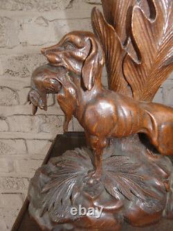 Exceptional pair black forest wood carved hunting dog statue sculptures vases