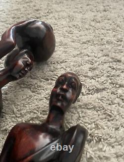 Hand carved solid wood Man & Woman. Excellent condition. Sold as a Pair