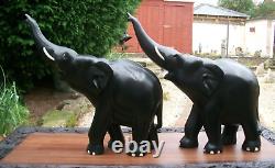 LARGE8.6kg PAIR OF CEYLON EBONY HAND CARVED WOODEN ELEPHANTS-TRUNKS UP
