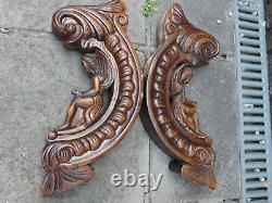 PAIR antique wood carved angel dolphin plaques statues