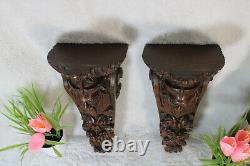 PAIR antique wood carved portrait head Wall console