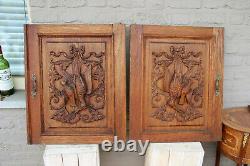 PAIR black forest wood carved hunting cabinet door panels trophy