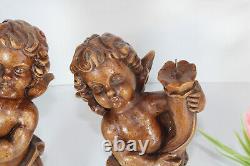 PAIR vintage German wood carved marked cherub angel candle holders statue