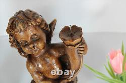 PAIR vintage German wood carved marked cherub angel candle holders statue