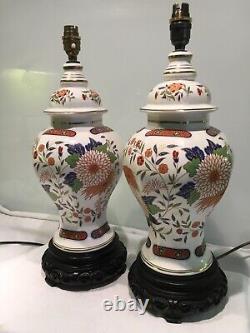 Pair Of Oriental Themed Vintage Porcelain Table Lamps On Carved Wood Bases
