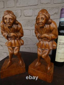 Pair antique wood carved hunchback notre dame statues