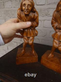 Pair antique wood carved hunchback notre dame statues