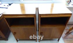 Pair of 1950's oak veneer bedside cabinets, carved rose knob, pull out shelf