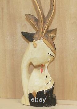 Vintage abstract hand carving wood statuette kissing couple