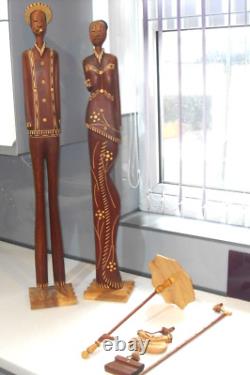 Grande taille 32 Paire vintage de sculptures en bois sculpté d'hommes et de femmes africains