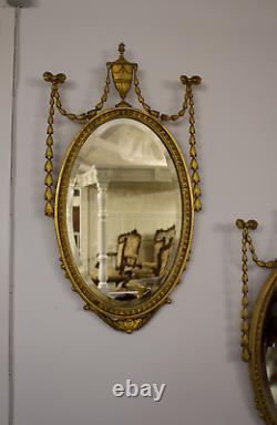 Miroir antique / Paire de miroirs muraux en bois doré sculpté du début du 20ème siècle