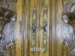 Paire d'anciennes portes en bois sculpté français, panneaux muraux en chêne massif récupéré
