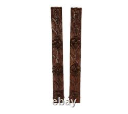 Paire d'antiques corbeaux en bois sculpté à la main, éléments architecturaux récupérés pour garnitures de panneaux