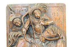 Paire d'antiques serre-livres chinois en bois sculpté représentant des hommes à cheval avec arc et flèche