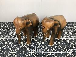 Paire d'éléphants en bois sculpté vintage d'Asie - Objets de collection élégants
