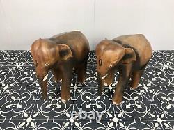 Paire d'éléphants en bois sculpté vintage d'Asie - Objets de collection élégants
