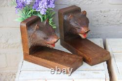 Paire d'étaux de livres rares en bois sculpté de la Forêt-Noire allemande avec des ours