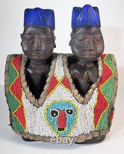 Paire de figures jumelles Yoruba Ibeji Nigeria en bois et perles