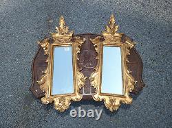 Paire de miroirs anciens en bois sculpté doré à la feuille d'or italien, meubles rares