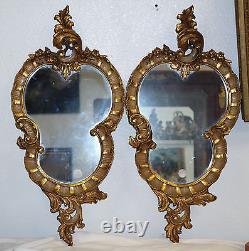 Paire de miroirs vénitiens en bois doré sculpté de style Rococo vers 1900
