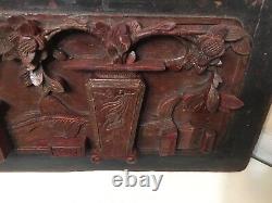 Paire de panneaux en relief en bois sculpté chinois antique avec des cachets d'exportation