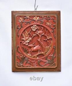 Paire de panneaux sculptés en bois rouge et doré chinois ancien