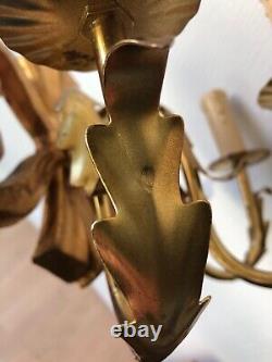 Paire de sconces en arc italiennes/florentines sculptées et dorées à la main