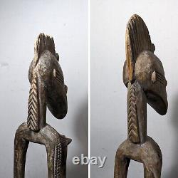Paire de statues de couple de pilonneur de rythme Senufo africain en bois sculpté