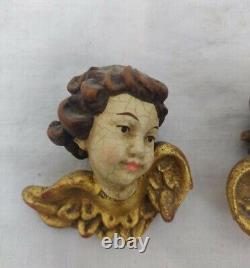 Paire de têtes d'ange / chérubin en bois sculpté et peint suspendues, art mural / décoration antique