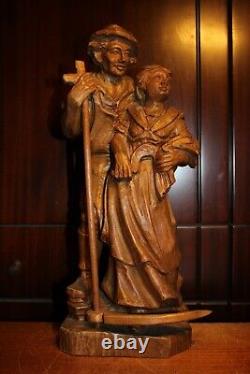 Sculpture de statue de couple de paysan et paysanne en bois sculpté à la main du 19ème siècle