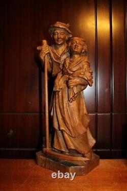 Sculpture de statue de couple de paysan et paysanne en bois sculpté à la main du 19ème siècle
