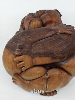 Sculpture en bois balinais magnifique du couple enlacement d'Ida Bagus Tantra