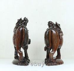 Superbe paire d'antiques buffles d'eau chinois sculptés en bois dur et incrustés d'argent