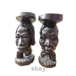 Vintage Une paire de cendrier en bois d'ébène sculpté avec des visages d'homme et de femme africains